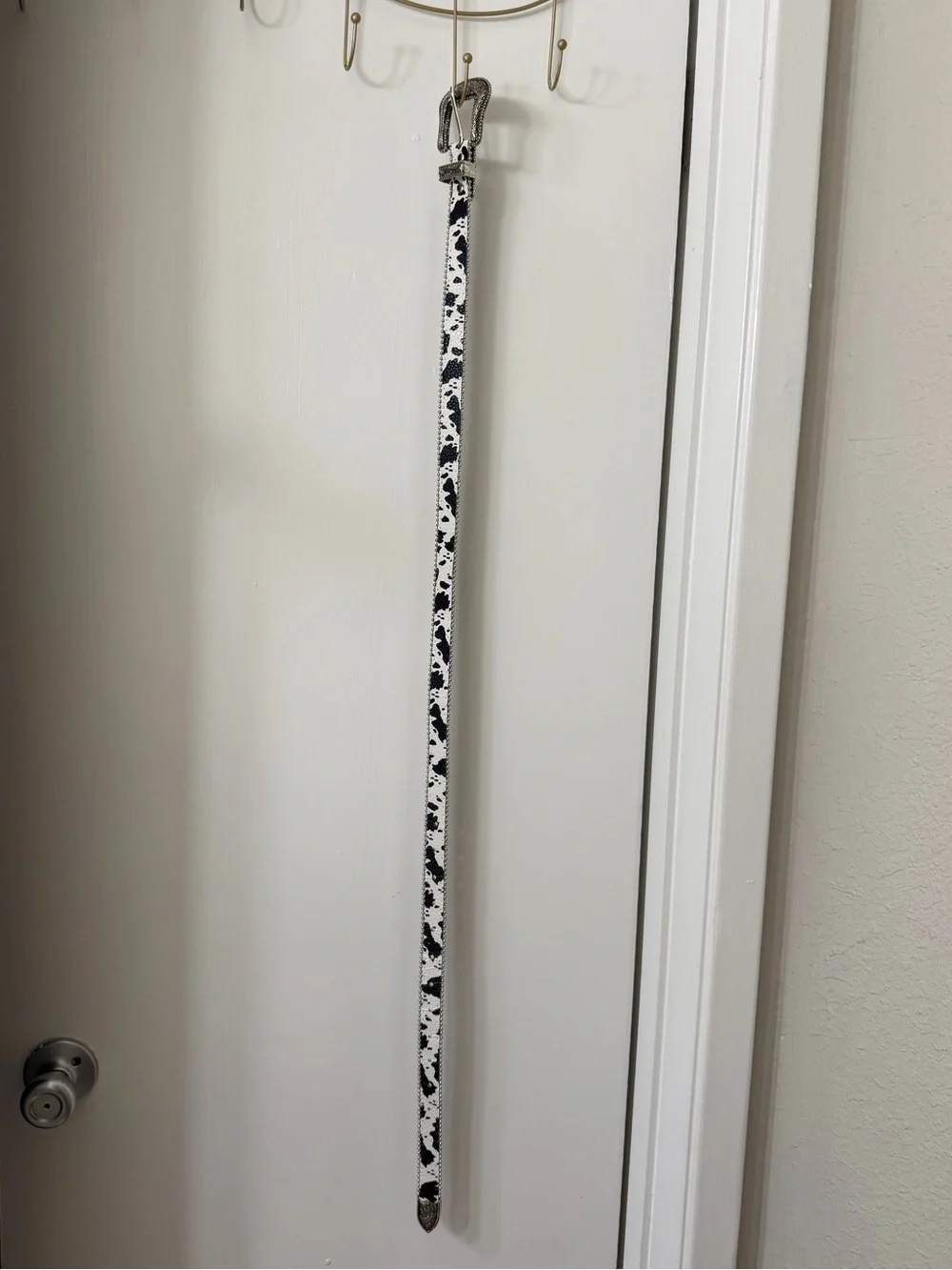 Western-Style Black and White Cow Print Belt with Silver Buckle